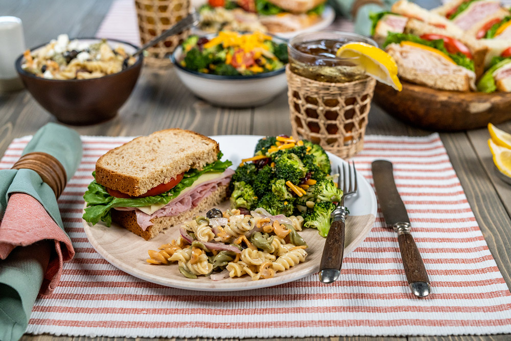 ham and swiss sandwich with pasta salad and sweet tea